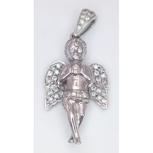 232 - A 9K White Gold Diamond Set Angel Pendant. 0.30ctw, 3.5cm length, 4g total weight. Ref: SC 7066