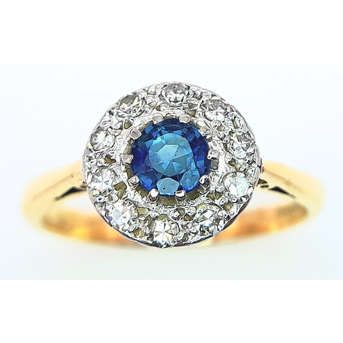 242 - A VINTAGE 18K YELLOW GOLD, PLATINUM DIAMOND & SAPPHIRE CLUSTER RING. 3.9G. SIZE M