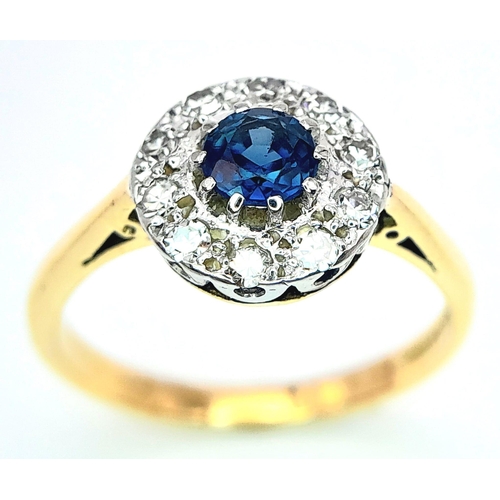 242 - A VINTAGE 18K YELLOW GOLD, PLATINUM DIAMOND & SAPPHIRE CLUSTER RING. 3.9G. SIZE M