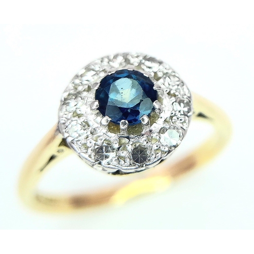 242 - A VINTAGE 18K YELLOW GOLD, PLATINUM DIAMOND & SAPPHIRE CLUSTER RING. 3.9G. SIZE M