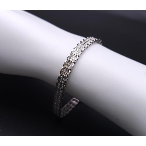 54 - A 9K White Gold Diamond Set Bracelet, with Under Safety Catch Fitting. 1ctw, 19cm length, 12.7g tota... 