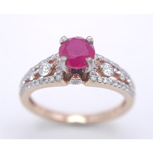 151 - A 14K YELLOW GOLD DIAMOND & RUBY RING. 0.40CT. 3.6G. SIZE N.