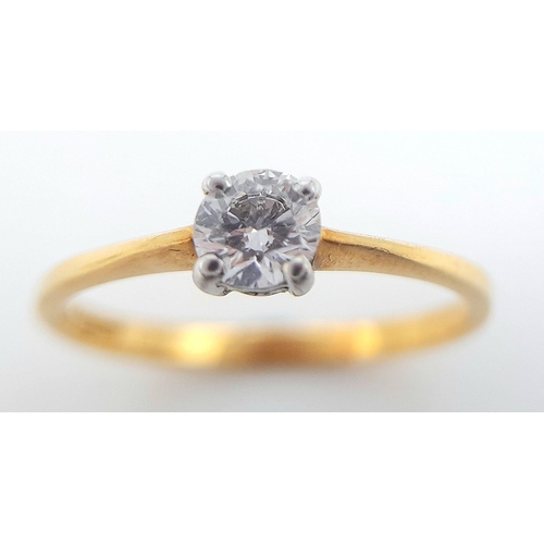 165 - AN 18K YELLOW GOLD DIAMOND SOLITAIRE RING. ROUND BRILLIANT CUT 0.30CT DIAMOND IN A 4 CLAW SETTING. 1... 