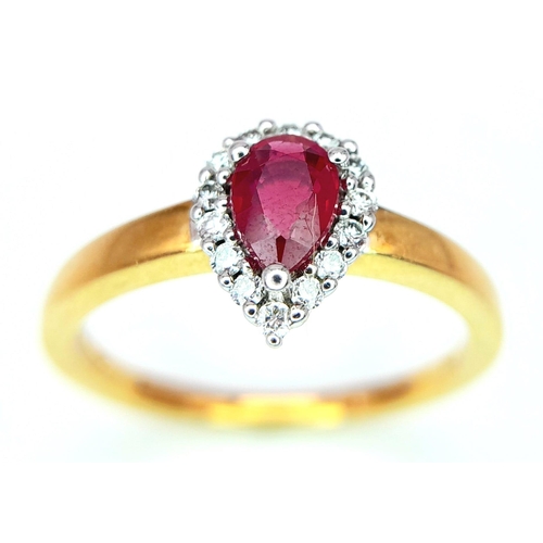 172 - AN 18K YELLOW GOLD DIAMOND & RUBY PEAR SHAPE RING. 0.50CT PEAR SHAPED RUBY WITH DIAMOND SURROUND. 3.... 