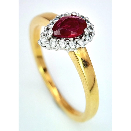 172 - AN 18K YELLOW GOLD DIAMOND & RUBY PEAR SHAPE RING. 0.50CT PEAR SHAPED RUBY WITH DIAMOND SURROUND. 3.... 