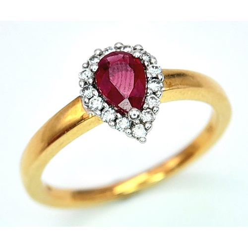 172 - AN 18K YELLOW GOLD DIAMOND & RUBY PEAR SHAPE RING. 0.50CT PEAR SHAPED RUBY WITH DIAMOND SURROUND. 3.... 