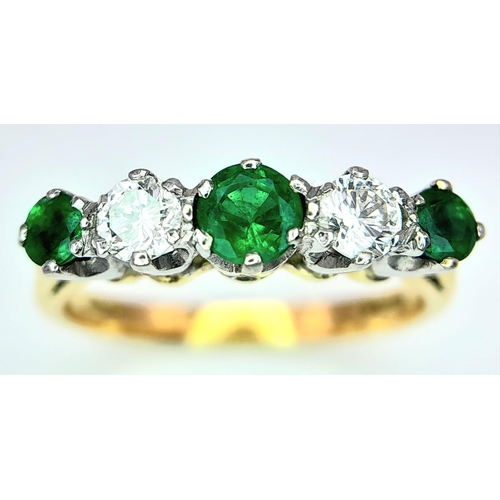 193 - AN 18K YELLOW GOLD DIAMOND & EMERALD RING. 0.20CTW DIAMONDS. 3.3G. SIZE N.