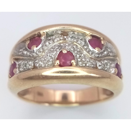 239 - A 9K Yellow Gold Diamond and Ruby Ring. Size N, 4.8g total weight. Ref: SC 7064