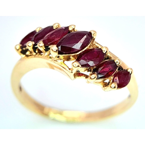 246 - A 14K YELLOW GOLD GARNET SET RING. 2.6G. SIZE K.