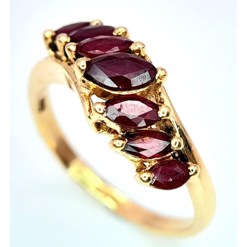 246 - A 14K YELLOW GOLD GARNET SET RING. 2.6G. SIZE K.