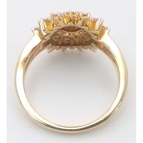 249 - A 9K YELLOW GOLD,  WHITE AND YELLOW DIAMOND SET CLUSTER RING. 3.3G. SIZE L 1/2. A MIXTURE OF ROUND A... 