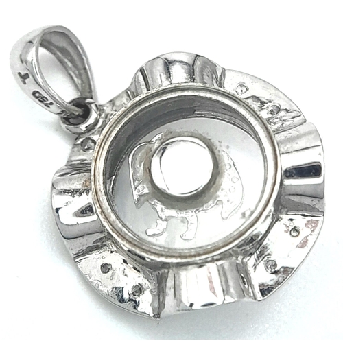 260 - A VERY CUTE 18K WHITE GOLD DIAMOND SET PENDANT WITH SPINNING DOG IN THE CENTRE! 2.2G. 2CM.