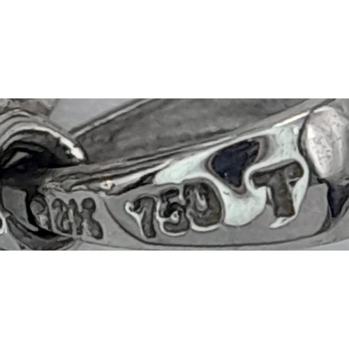 260 - A VERY CUTE 18K WHITE GOLD DIAMOND SET PENDANT WITH SPINNING DOG IN THE CENTRE! 2.2G. 2CM.