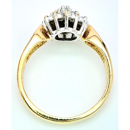 268 - AN 18K YELLOW GOLD DIAMOND SET CLUSTER RING. 0.33CT. 3.7G. SIZE M.