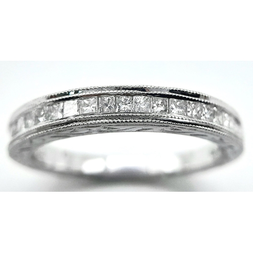 299 - A 9K WHITE GOLD DIAMOND BAND RING. 0.40CTW. 2.7G. SIZE N.