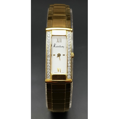 117 - AN ORIGINAL KUTCHINSKY GOLD TONE BRACELET LADIES WATCH - WITH DIAMONDS SET EITHER SIDE OF THE DIAL. ... 