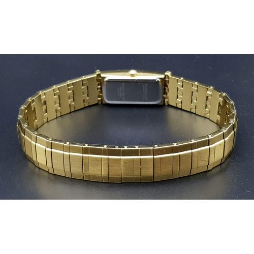 117 - AN ORIGINAL KUTCHINSKY GOLD TONE BRACELET LADIES WATCH - WITH DIAMONDS SET EITHER SIDE OF THE DIAL. ... 