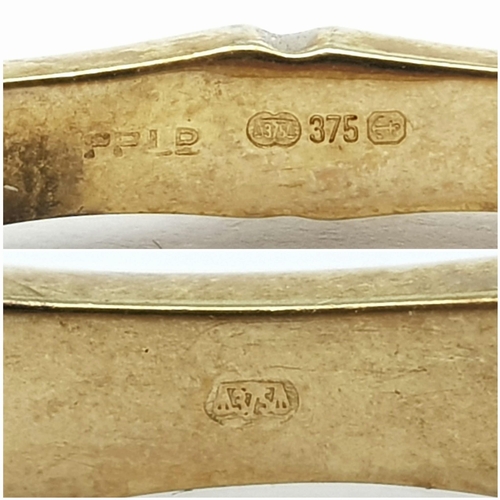 184 - A 9K GOLD HINGED BANGLE IN BAMBOO STYLE .   9.0gms