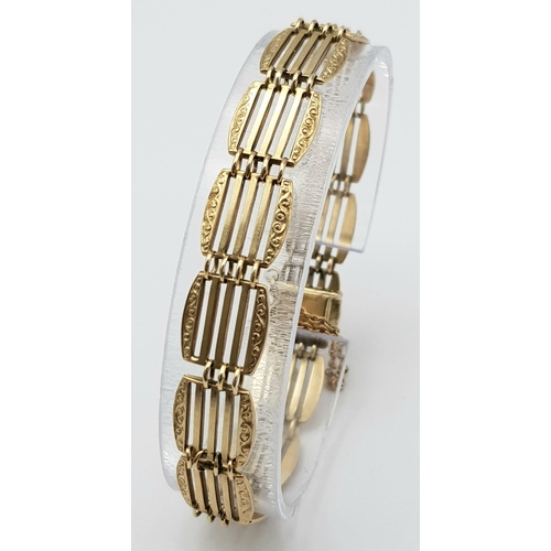 191 - A 9K GOLD ORNATELY DECORATED GATE BRACELET .   11.1gms