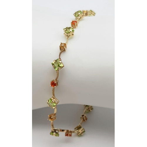 212 - A 14K Yellow Gold Multi Coloured Gemstone Set Bracelet. 18.5cm length, 4.2g total weight. Ref: SC 70... 