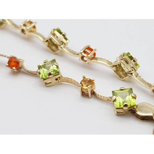 212 - A 14K Yellow Gold Multi Coloured Gemstone Set Bracelet. 18.5cm length, 4.2g total weight. Ref: SC 70... 