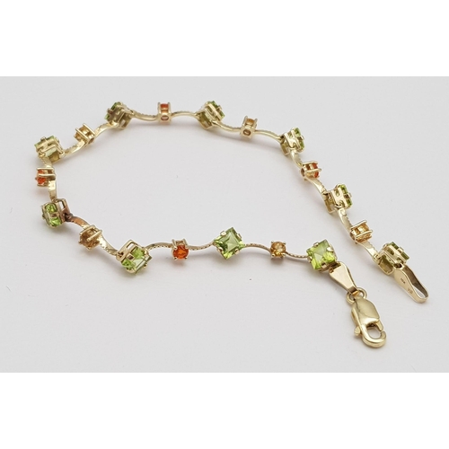 212 - A 14K Yellow Gold Multi Coloured Gemstone Set Bracelet. 18.5cm length, 4.2g total weight. Ref: SC 70... 