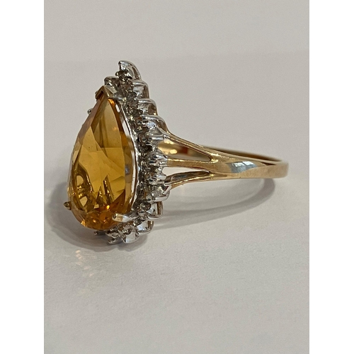 42 - Stunning 9 carat GOLD and ORANGE TOURMALINE RING. Having a large ( 3 carat ) Pear Cut Orange Tourmal... 