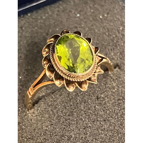 56 - Stunning 9 carat GOLD and PERIDOT RING, Having a beautifully faceted large (1.5 carat) Oval Cut PERI... 