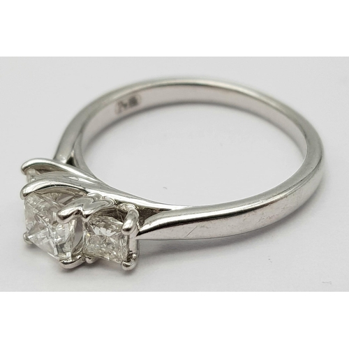 68 - AN 18K WHITE GOLD TRILOGY PRINCESS CUT DIAMOND RING - 0.75CTW. 3.2G. SIZE K.