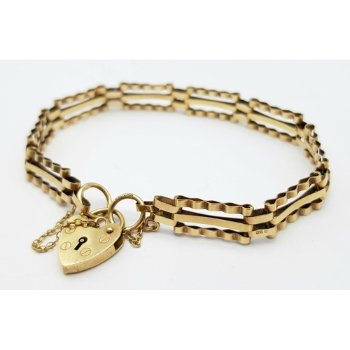 134 - A 9K Yellow Gold Gate Bracelet with Heart Clasp. 17cm. 5.65g weight.