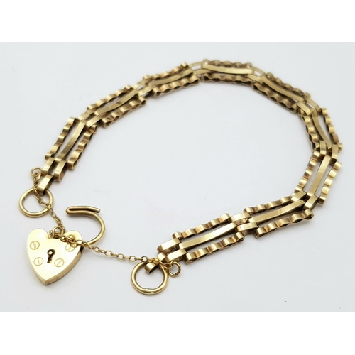 134 - A 9K Yellow Gold Gate Bracelet with Heart Clasp. 17cm. 5.65g weight.