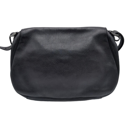 192 - A Prada Black Leather Crossbody Satchel Bag. Textured exterior with buckled flap. Spacious leather a... 