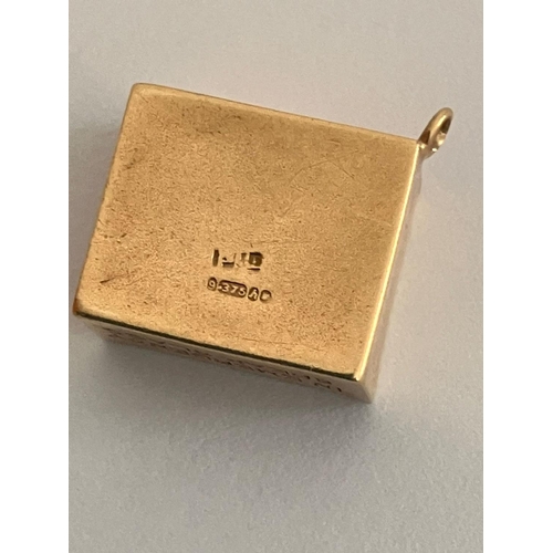 237 - Vintage 9 carat GOLD CHARM, Consisting a 10 SHILLING NOTE folded inside a GOLD  case. 2.3 Grams.