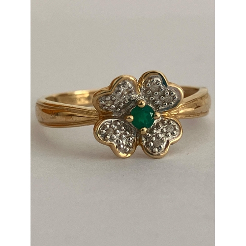 216 - 9 carat ‘Four leaf clover’ GOLD RING Set with DIAMONDS and EMERALD. Full hallmark. Complete with rin... 