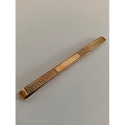 63 - Vintage 9 carat GOLD TIE CLIP.Having attractive engine turned design. Full UK hallmark. 2.7 grams. E... 