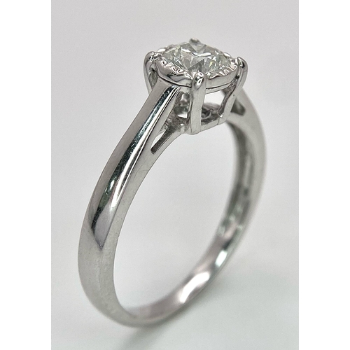 197 - An 18K White Gold Diamond Solitaire Ring. 0.65ct brilliant round cut diamond. Size M. 2.75g total we... 