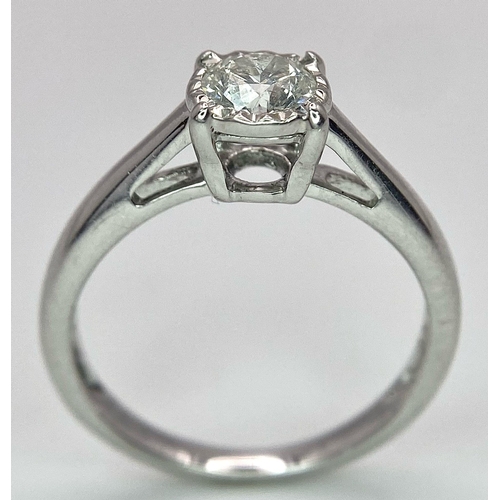 197 - An 18K White Gold Diamond Solitaire Ring. 0.65ct brilliant round cut diamond. Size M. 2.75g total we... 