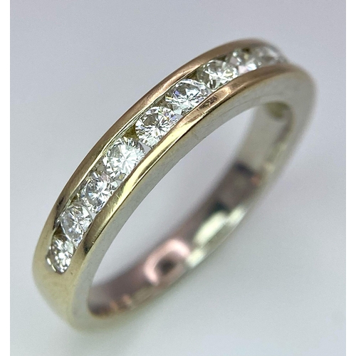 226 - An 18K Yellow Gold Diamond Half Eternity Ring. 12 brilliant round cut diamonds - 0.60ctw. Size N. 4.... 