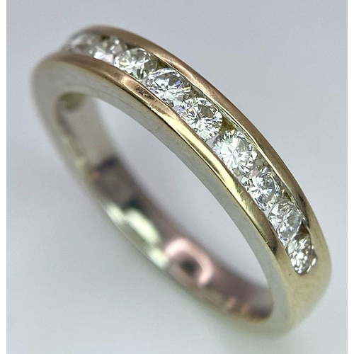 226 - An 18K Yellow Gold Diamond Half Eternity Ring. 12 brilliant round cut diamonds - 0.60ctw. Size N. 4.... 