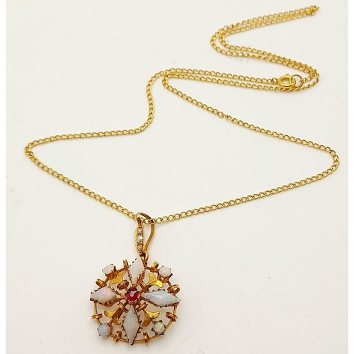 431 - A 9K Yellow Gold and Opal Pendant on a 9K Yellow Gold Disappearing Necklace. Comes with a presentati... 