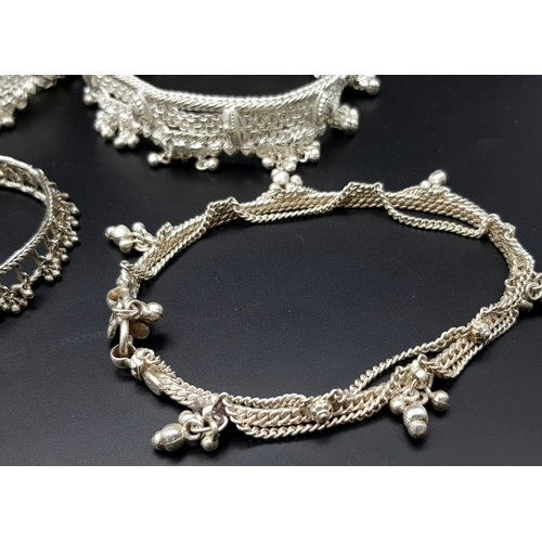 447 - A Vintage Indian Silver (800) Jewellery Collection. Includes 4 upper arm decorative bands and one ba... 