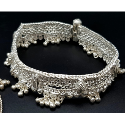 447 - A Vintage Indian Silver (800) Jewellery Collection. Includes 4 upper arm decorative bands and one ba... 