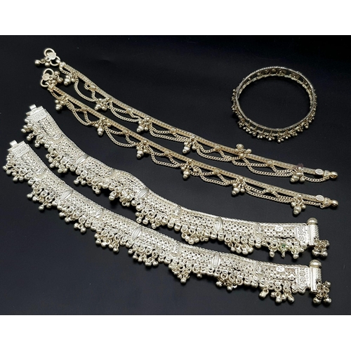 447 - A Vintage Indian Silver (800) Jewellery Collection. Includes 4 upper arm decorative bands and one ba... 