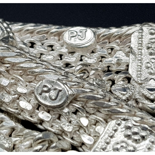 447 - A Vintage Indian Silver (800) Jewellery Collection. Includes 4 upper arm decorative bands and one ba... 