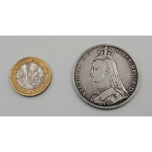 449 - An 1899 Queen Victoria Silver Crown Coin. VF/EF grade but please see photos.