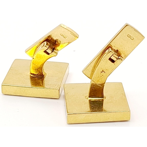 608 - A PAIR OF 18K GOLD CARTIER STYLE CUFFLINKS WITH U.K. HALLMARK .     16.5gms