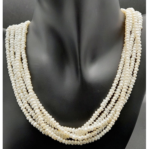 181 - A vintage, five row, natural, white pearl necklace, with a statement gold plated clasp. Length: 42 c... 