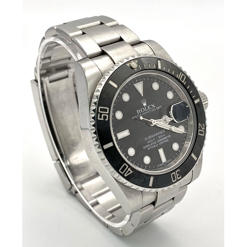 23 - A Rolex Submariner Date Automatic Gents Watch. Stainless steel bracelet and case - 41mm. Black dial ... 