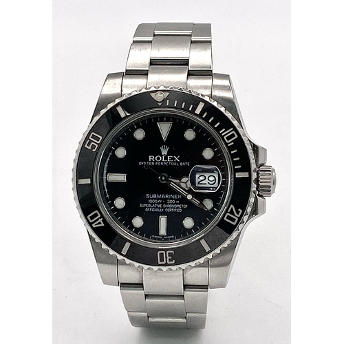 23 - A Rolex Submariner Date Automatic Gents Watch. Stainless steel bracelet and case - 41mm. Black dial ... 