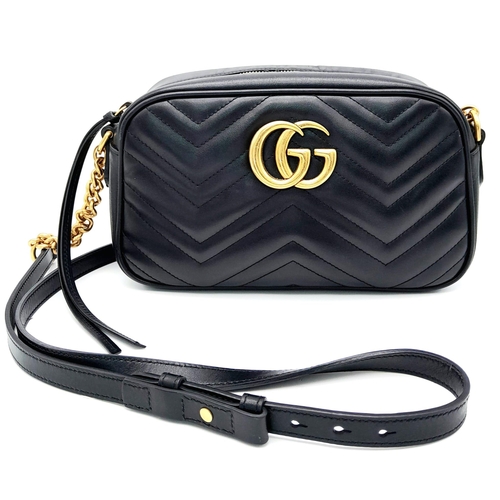 34 - A Gucci Marmont Quilted Leather Cross-Body bag. Adjustable shoulder strap. Gold-tone Hardware. Beige... 